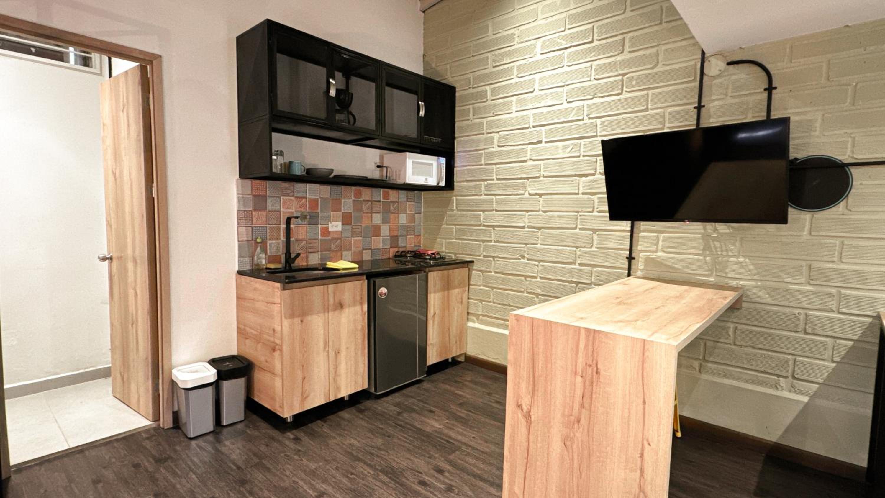 FRN101 Cozy loft located in a popular in Poblado By Roots Rentals