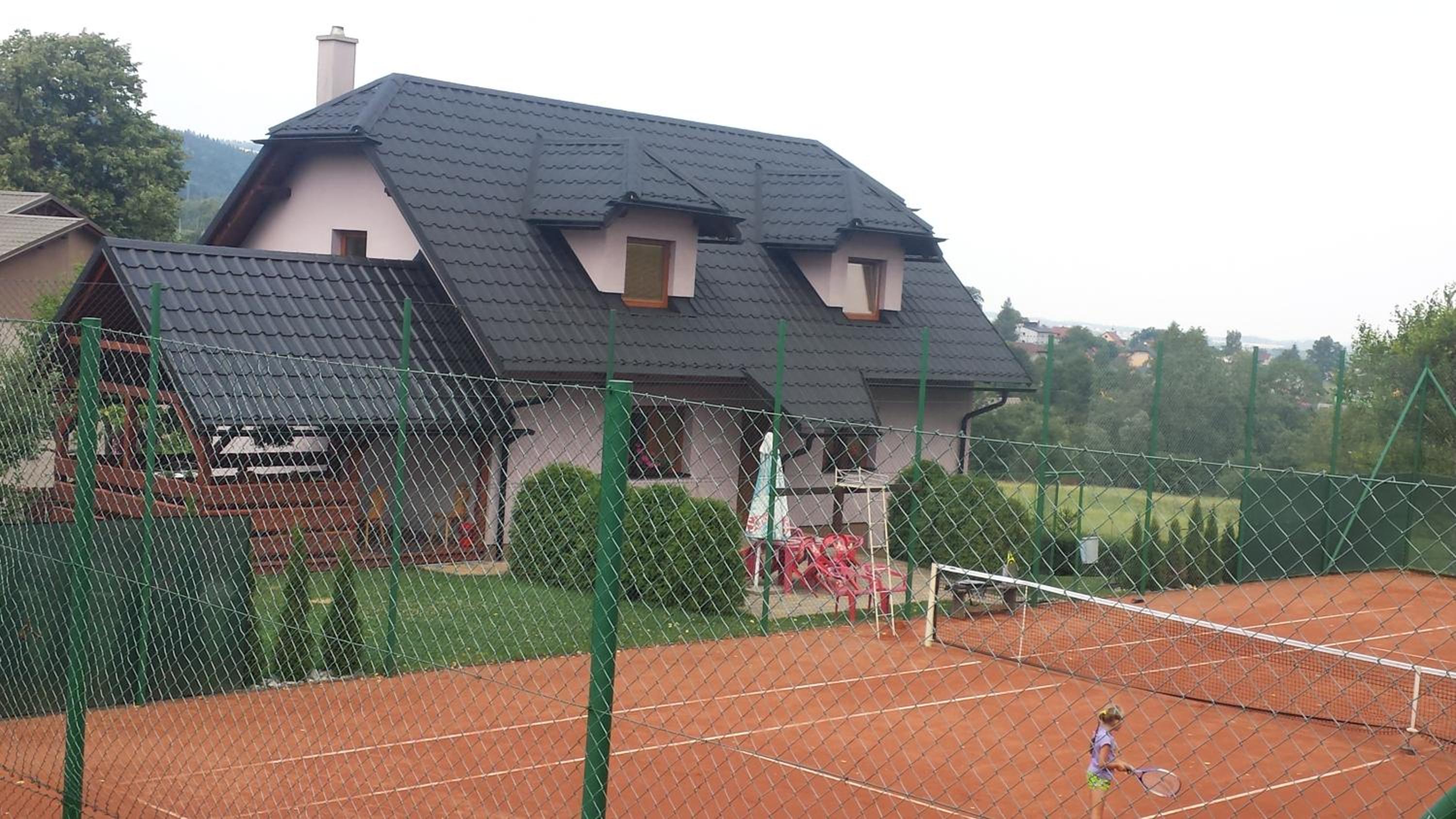 Apartmány u tenisového kurtu