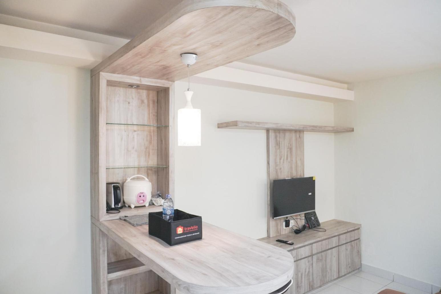 Comfort and Minimalist Studio at Amethyst Apartment By Travelio view 3