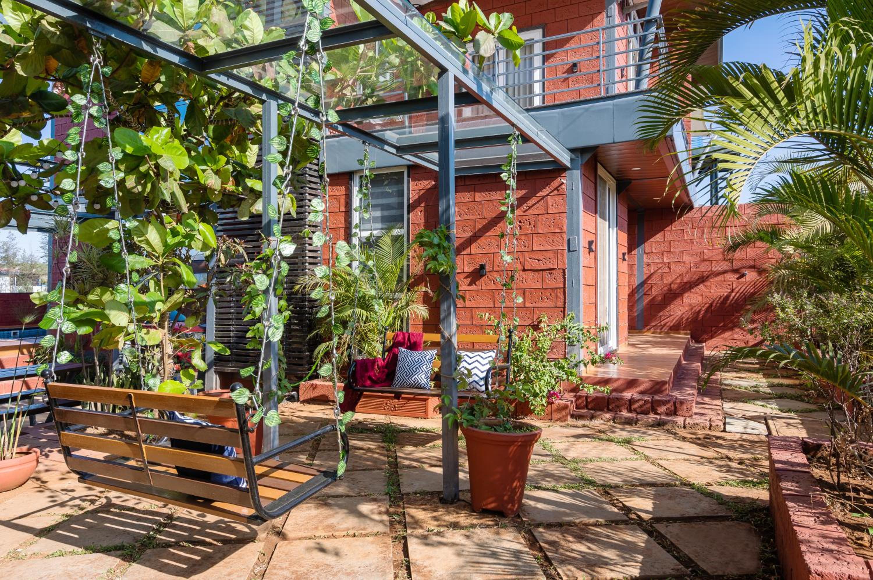 SaffronStays Hobbes - 3BR private pool villa with lawn, family lounge, BBQ nights & deck sit-outs, ideal for celebrations