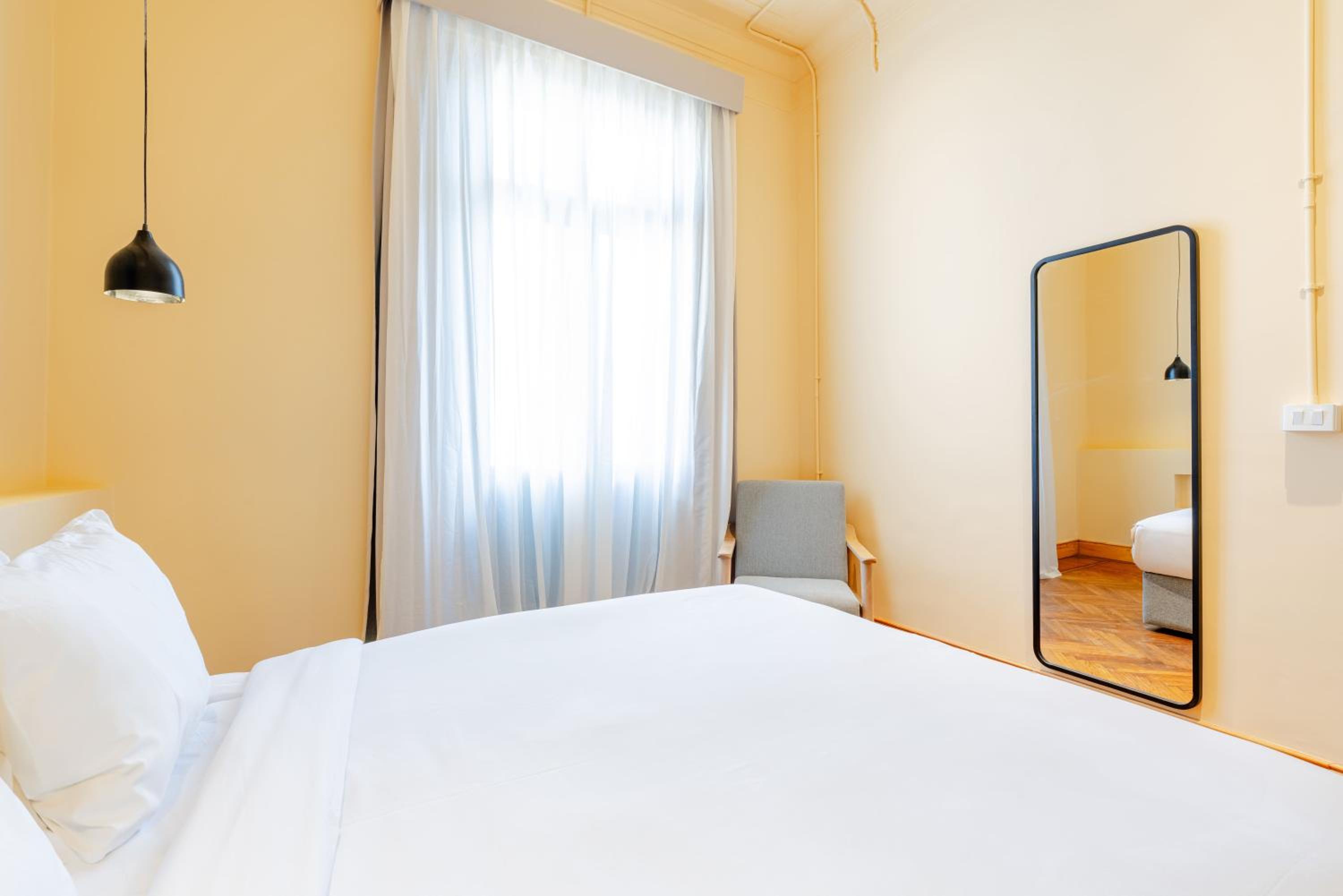 grey l studio apartments Downtown Alexandria Menasce House - Image 2