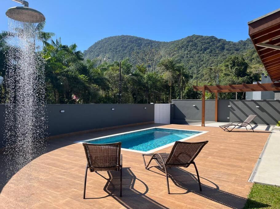 Casa Mero no Residencial Mar Verde em Caraguatatuba