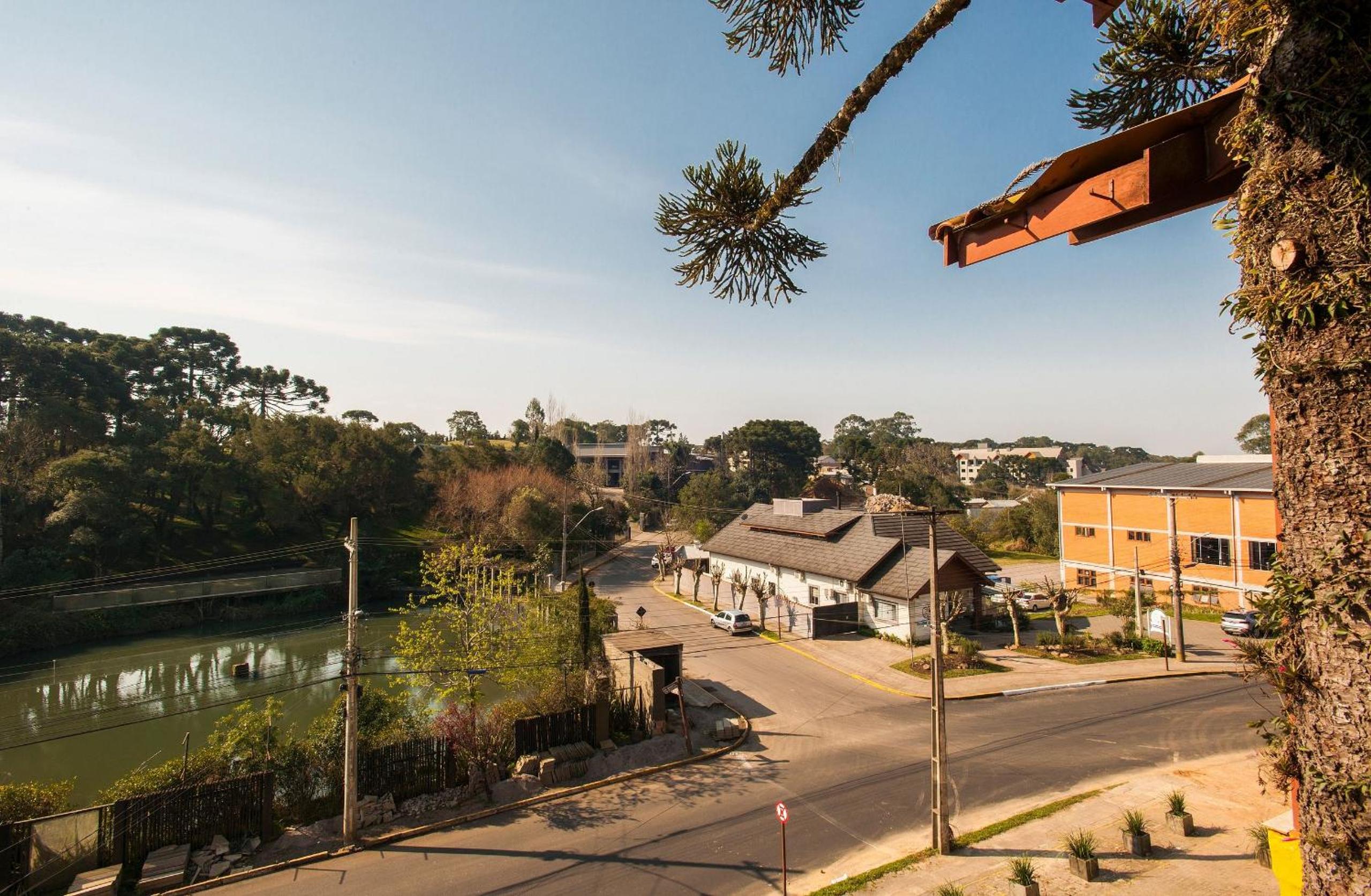 LOCAR-IN GRAMADO - Chalés e Apartamentos Hill Top Centro