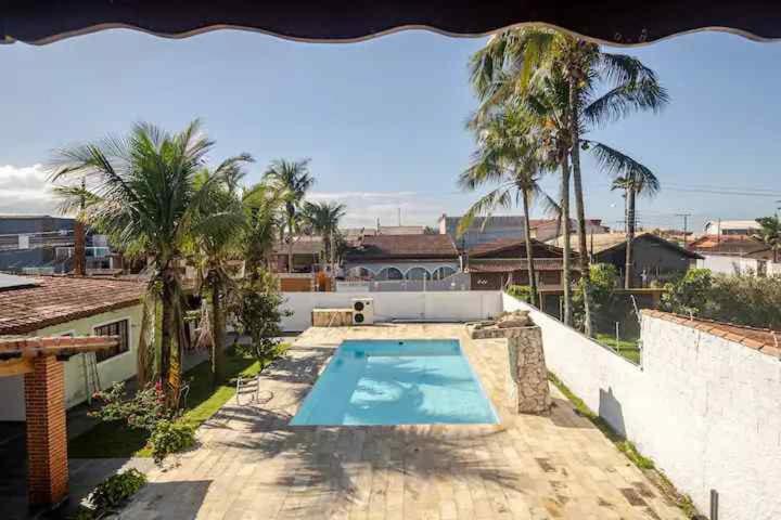 Casa na praia com piscina aquecida