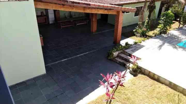 Casa na praia com piscina aquecida