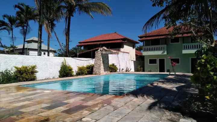 Casa na praia com piscina aquecida