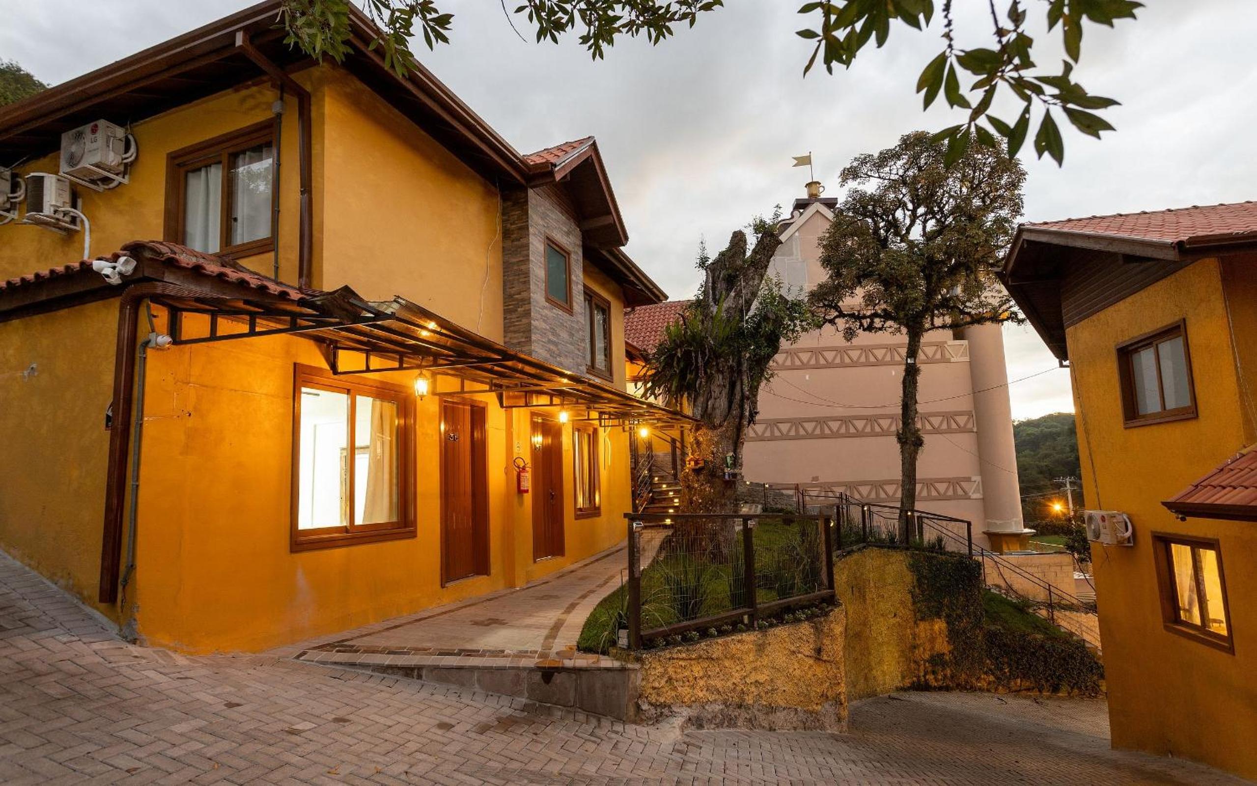 LOCAR-IN GRAMADO - Chalés e Apartamentos Hill Top Centro