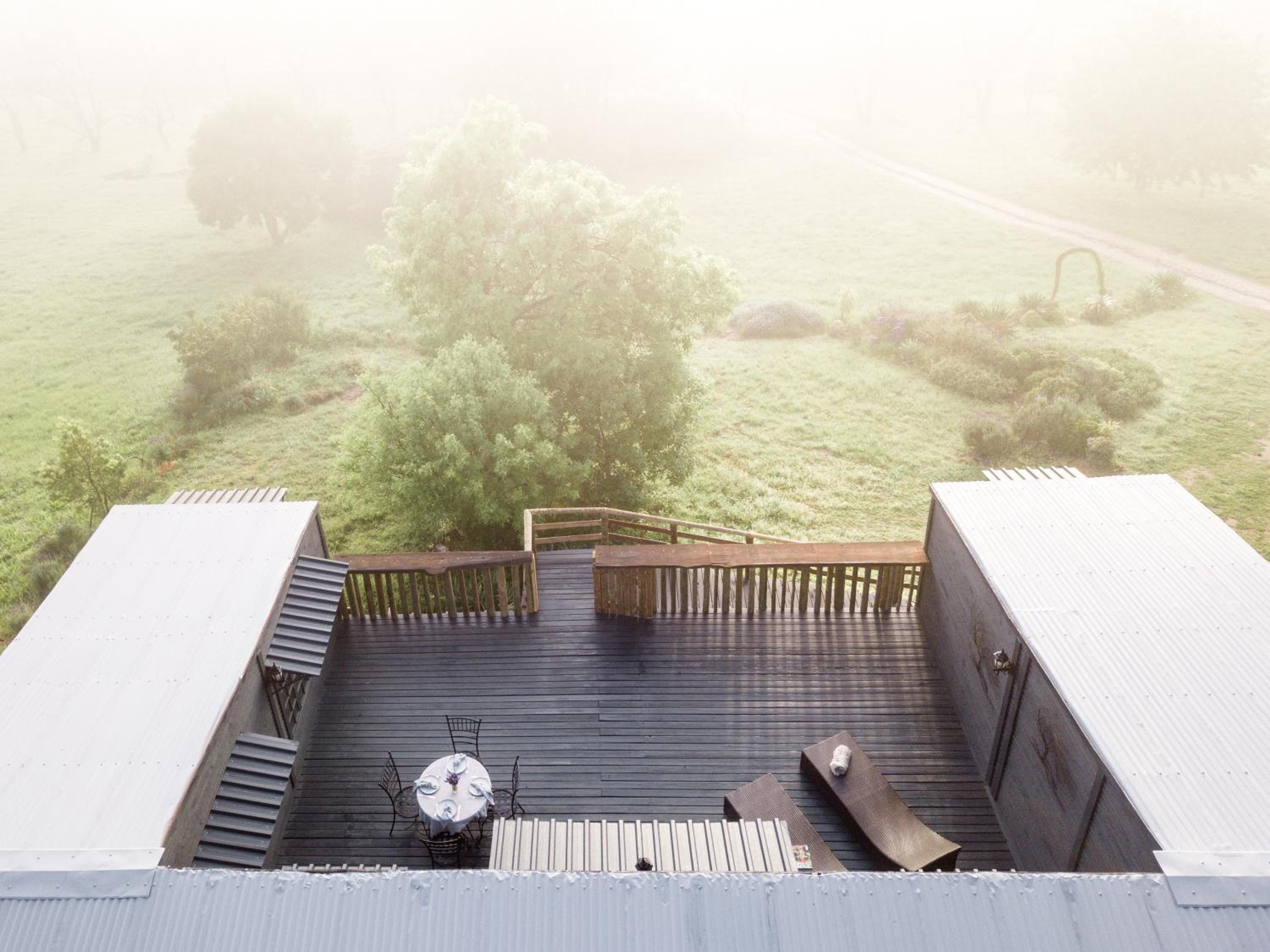 Avemore Vineyard View - wood fired hot tub and full power back up view 5