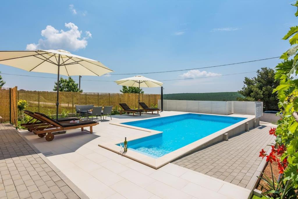 Holiday home with heated pool view 2