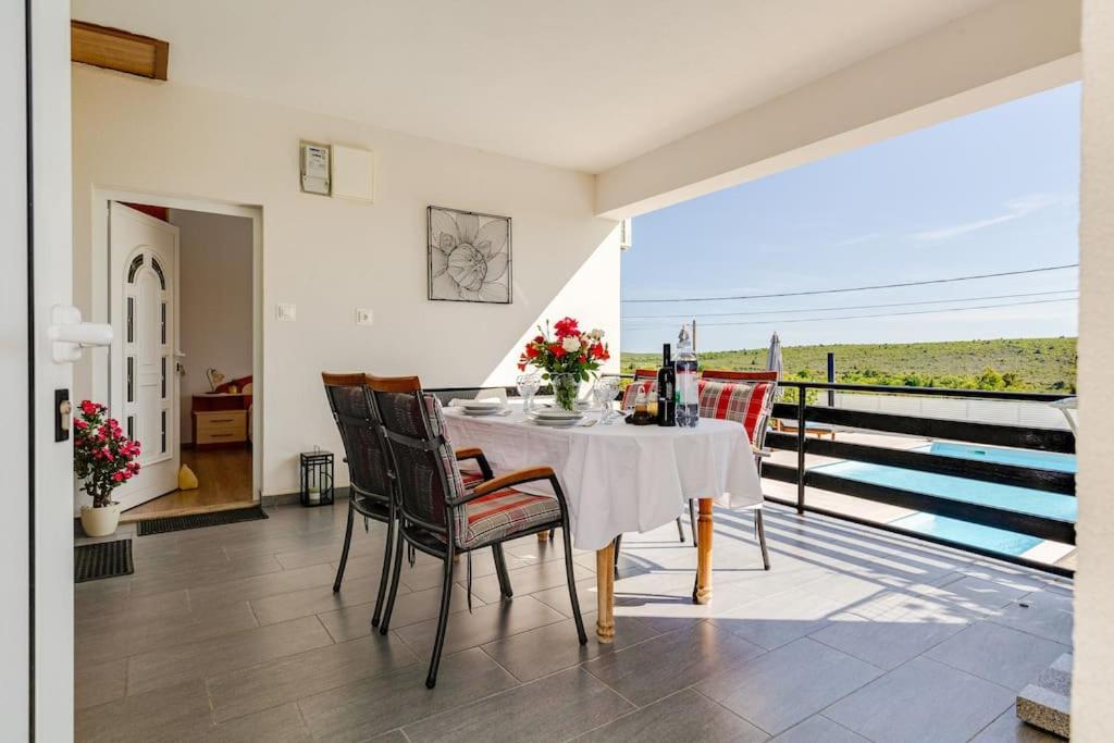 Holiday home with heated pool view 3