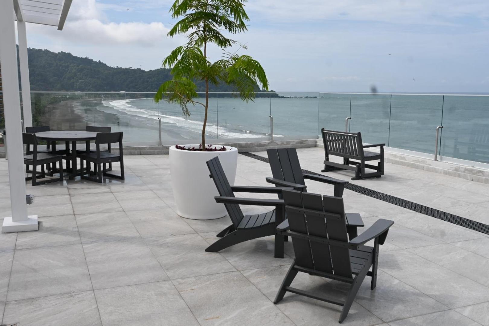 Modern beachfront condo perfect for the digital nomad in vibrant central Jacó