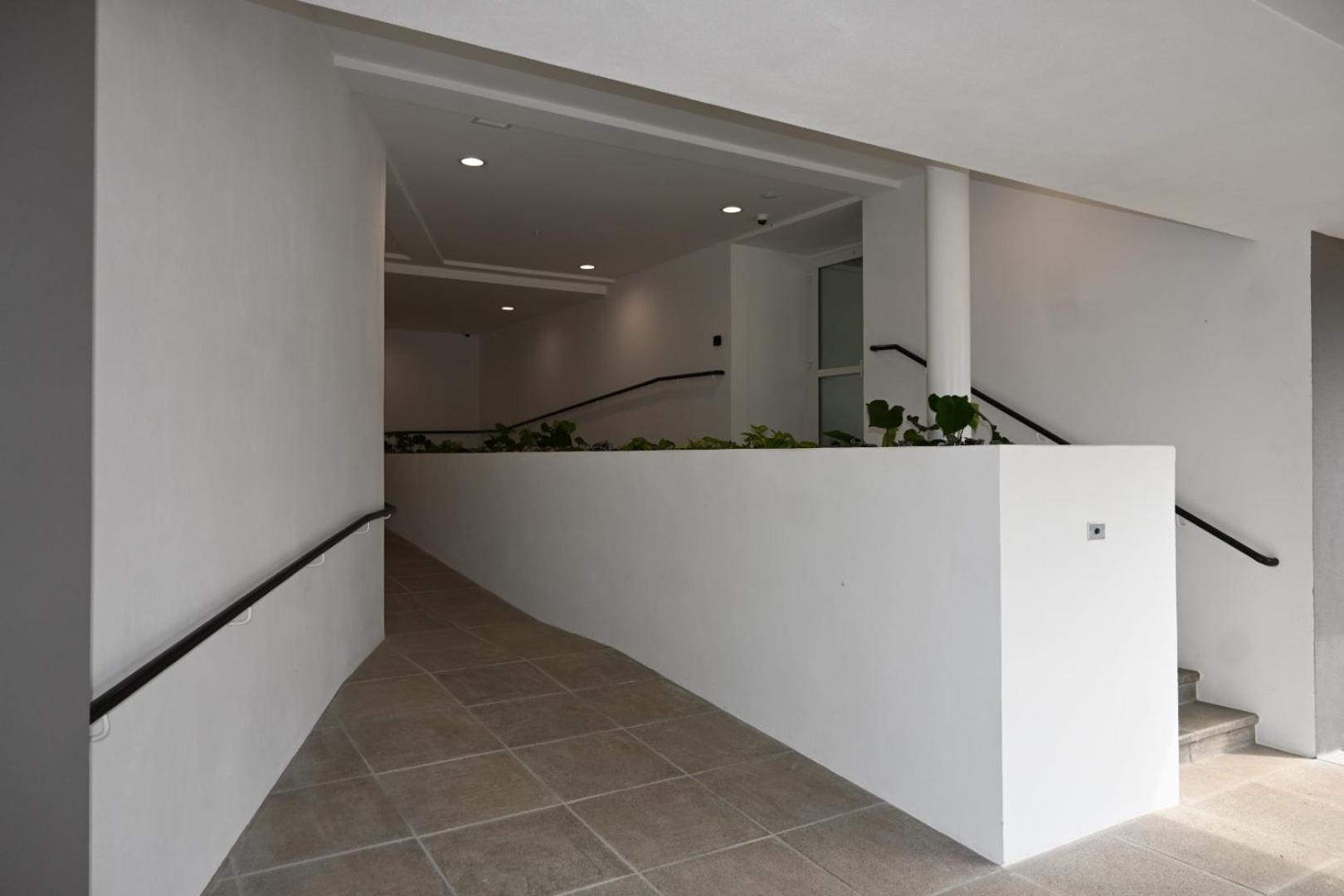 Modern beachfront condo perfect for the digital nomad in vibrant central Jacó