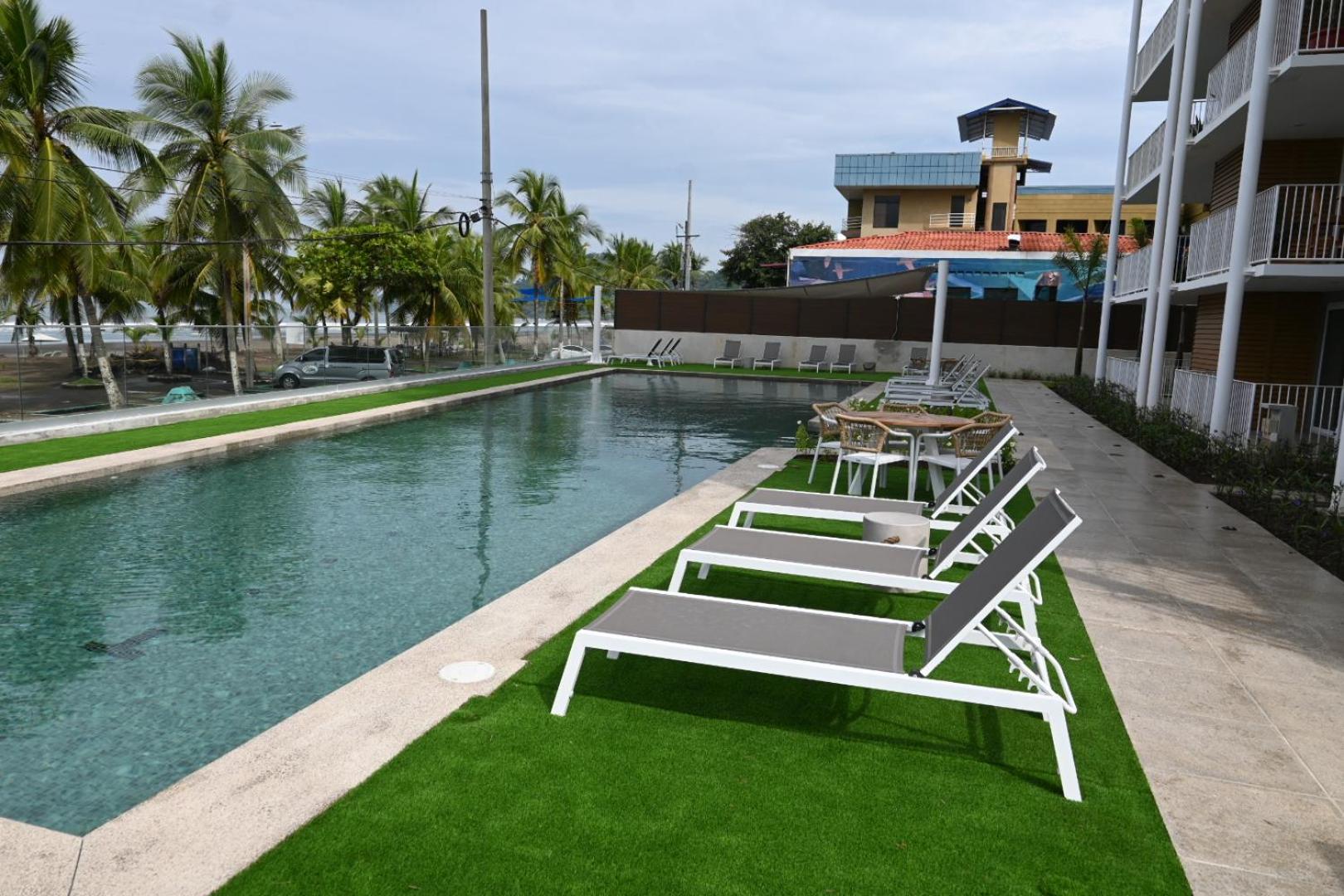 Modern beachfront condo perfect for the digital nomad in vibrant central Jacó