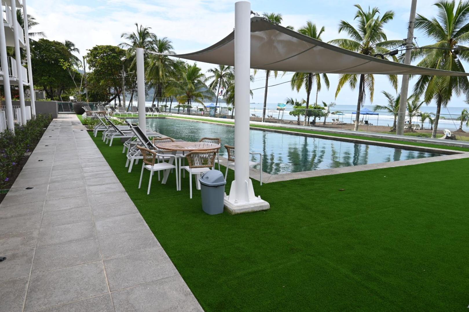 Modern beachfront condo perfect for the digital nomad in vibrant central Jacó