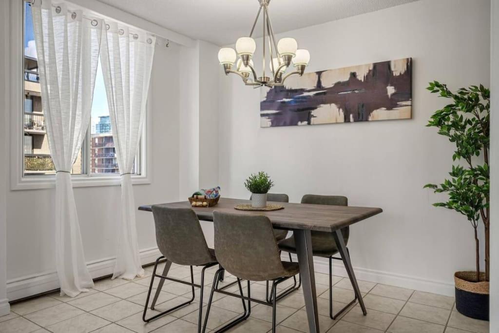 Downtown Near Rogers Place with Covered Parking, Sleeps 6, Pool Table, Sauna, Gym, Two Bedrooms & More