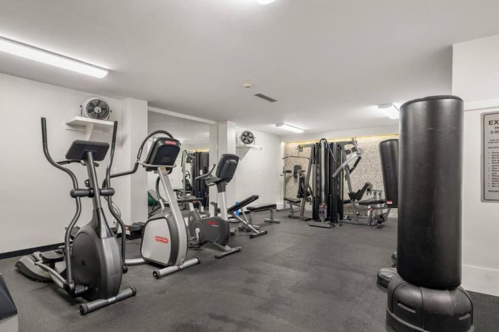 Downtown Near Rogers Place with Covered Parking, Sleeps 6, Pool Table, Sauna, Gym, Two Bedrooms & More