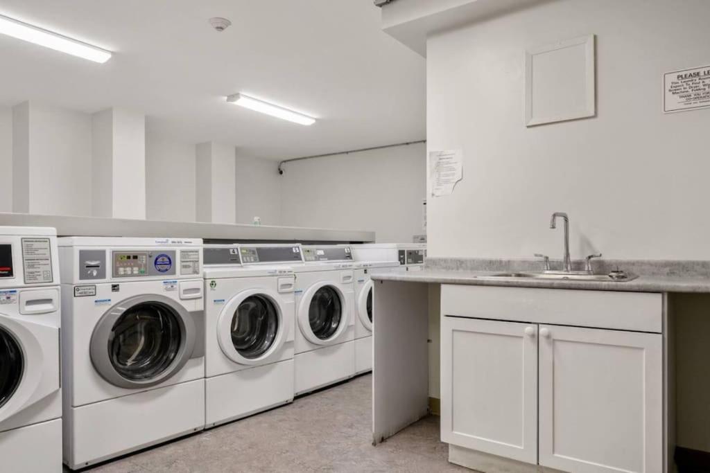 Downtown Near Rogers Place with Covered Parking, Sleeps 6, Pool Table, Sauna, Gym, Two Bedrooms & More