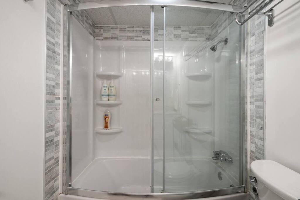 Downtown Near Rogers Place with Covered Parking, Sleeps 6, Pool Table, Sauna, Gym, Two Bedrooms & More