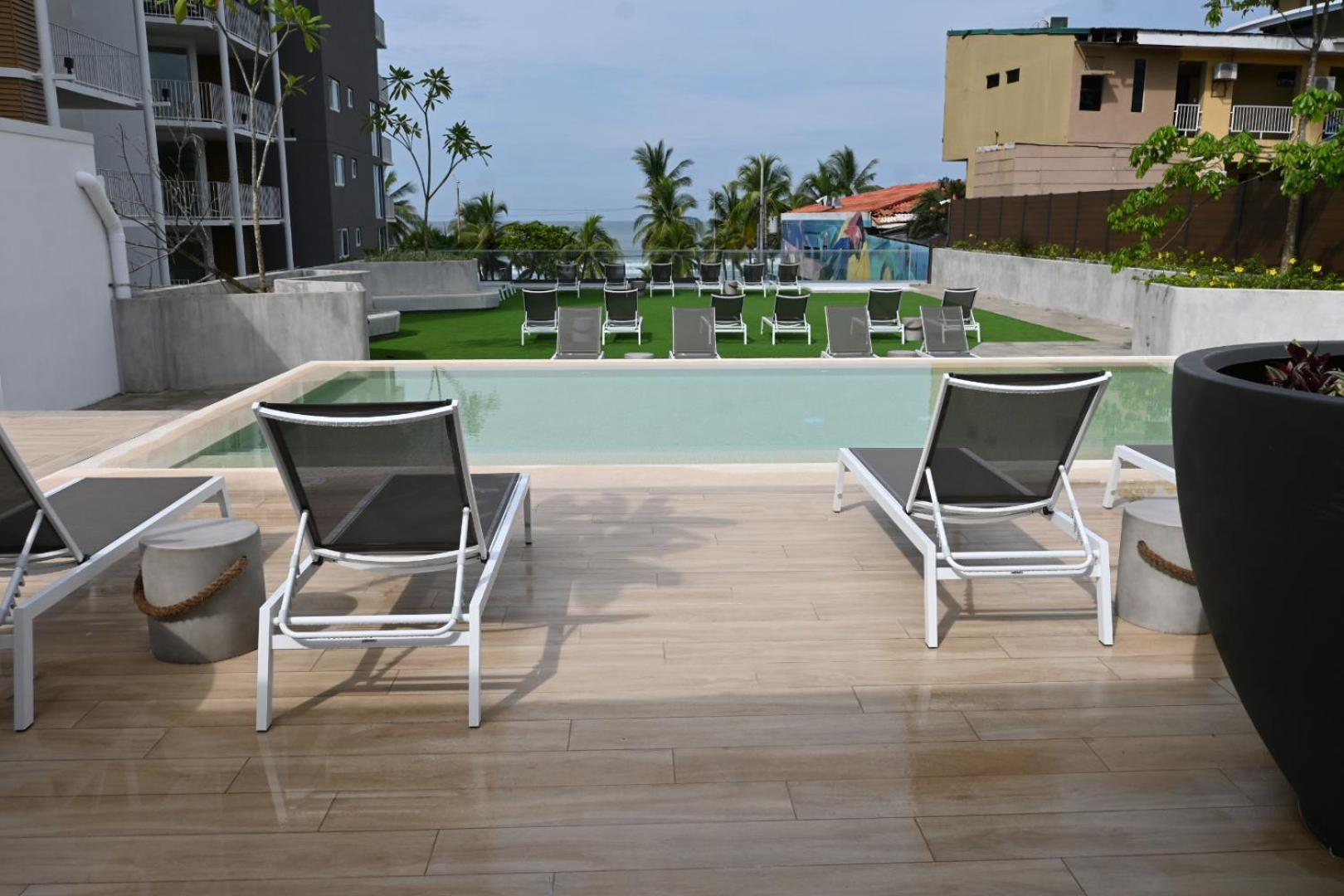 Modern beachfront condo perfect for the digital nomad in vibrant central Jacó