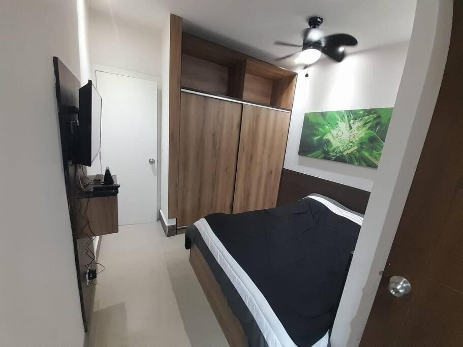 55-9B Hermoso moderno y completo apartamento view 5