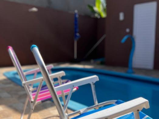 CASAS com PISCINA SENSACIONAIS NO CENTRO - Residencial Tchê