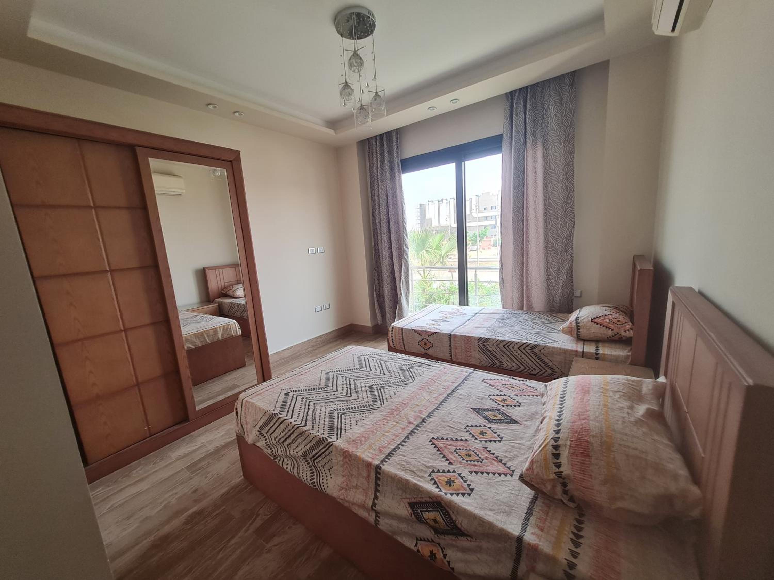 Shared City Stay at Midtown Compound next to the AUC University