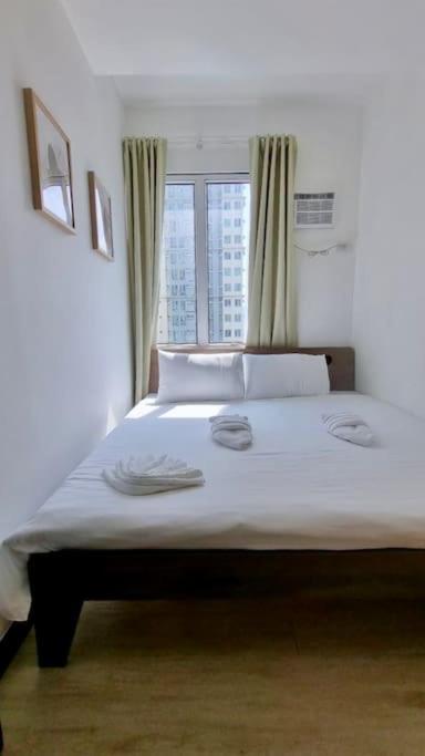 Spacious 2BR Condo San Lorenzo Place 4KM Airport view 2