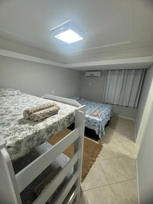 Ap pé na areia itapema frente mar