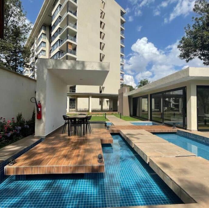 Sunset Views by Leisure Nomad with Pool, Gym and Work Desk view 3