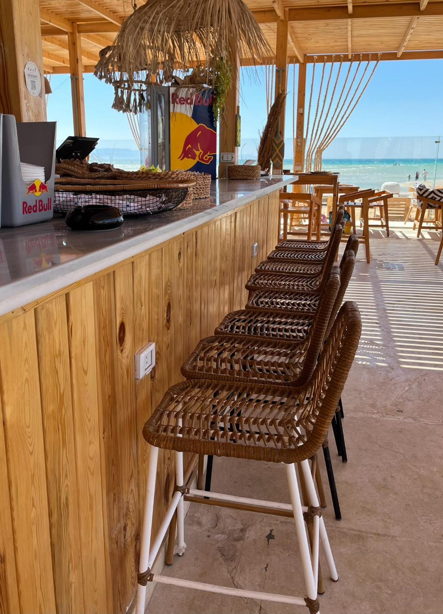 Studio with Private Door Front Seating Area at La Hacienda