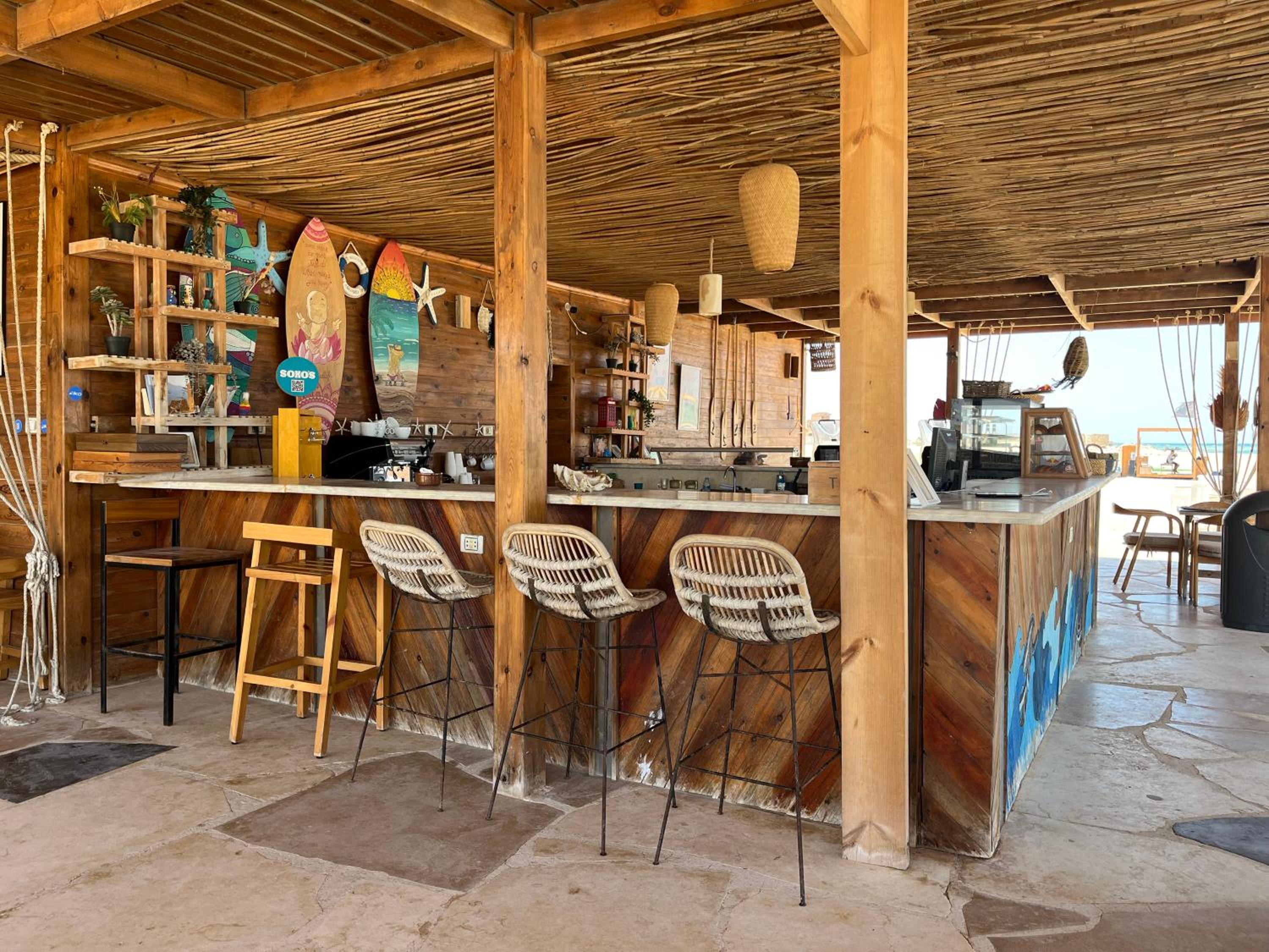 Studio with Private Door Front Seating Area at La Hacienda