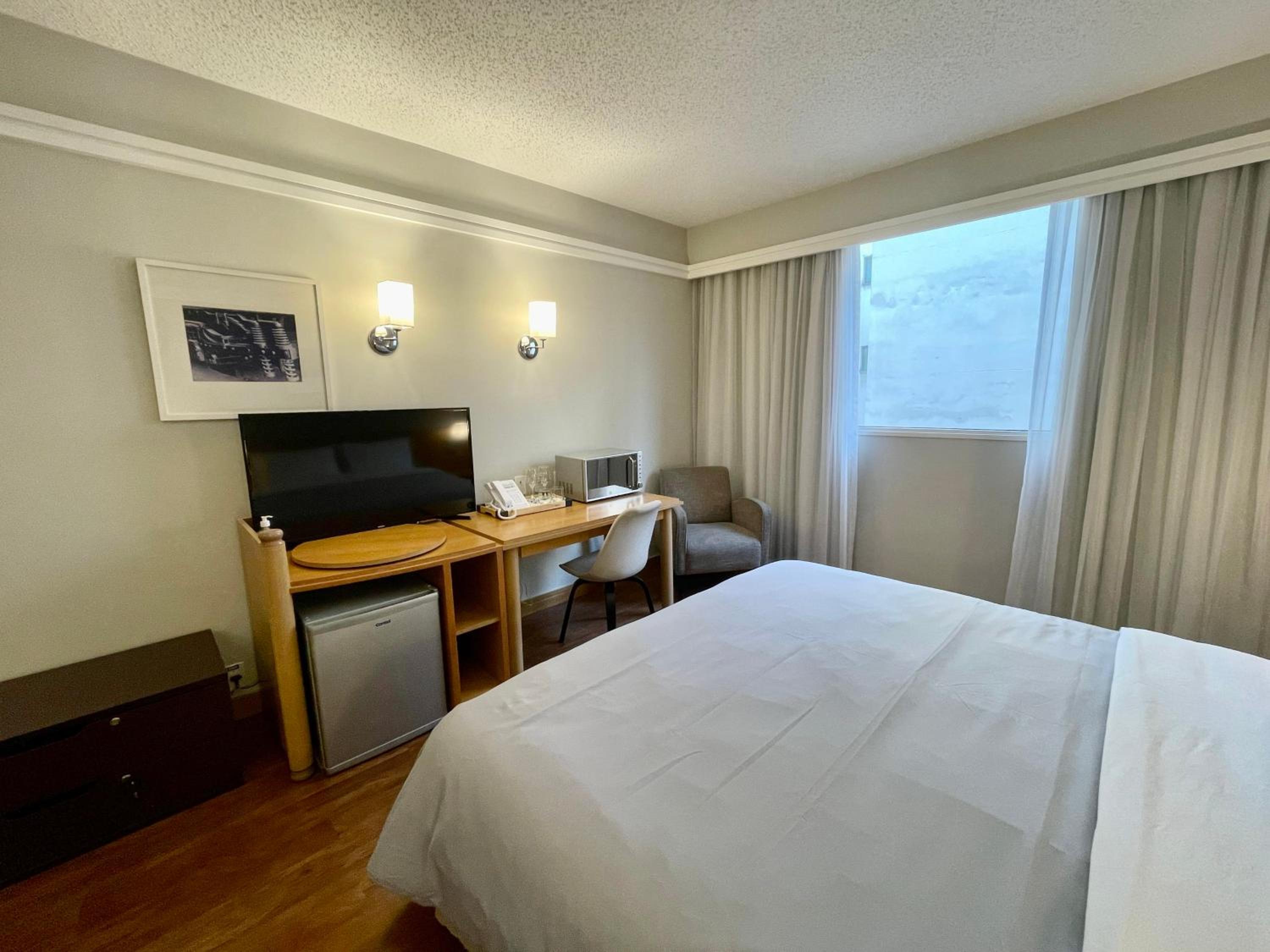 Flat particular no hotel Slav. Downtown c/vaga