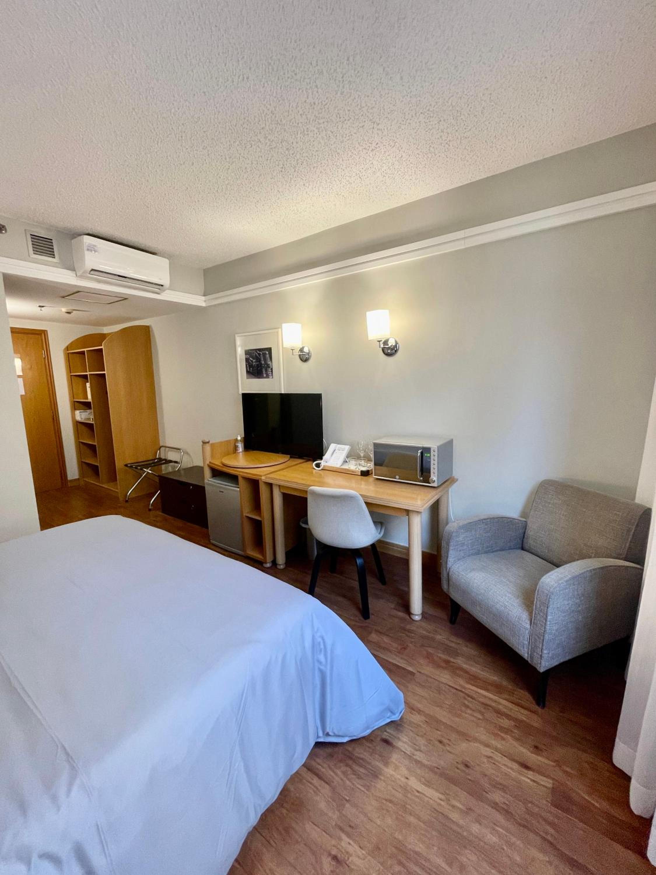 Flat particular no hotel Slav. Downtown c/vaga