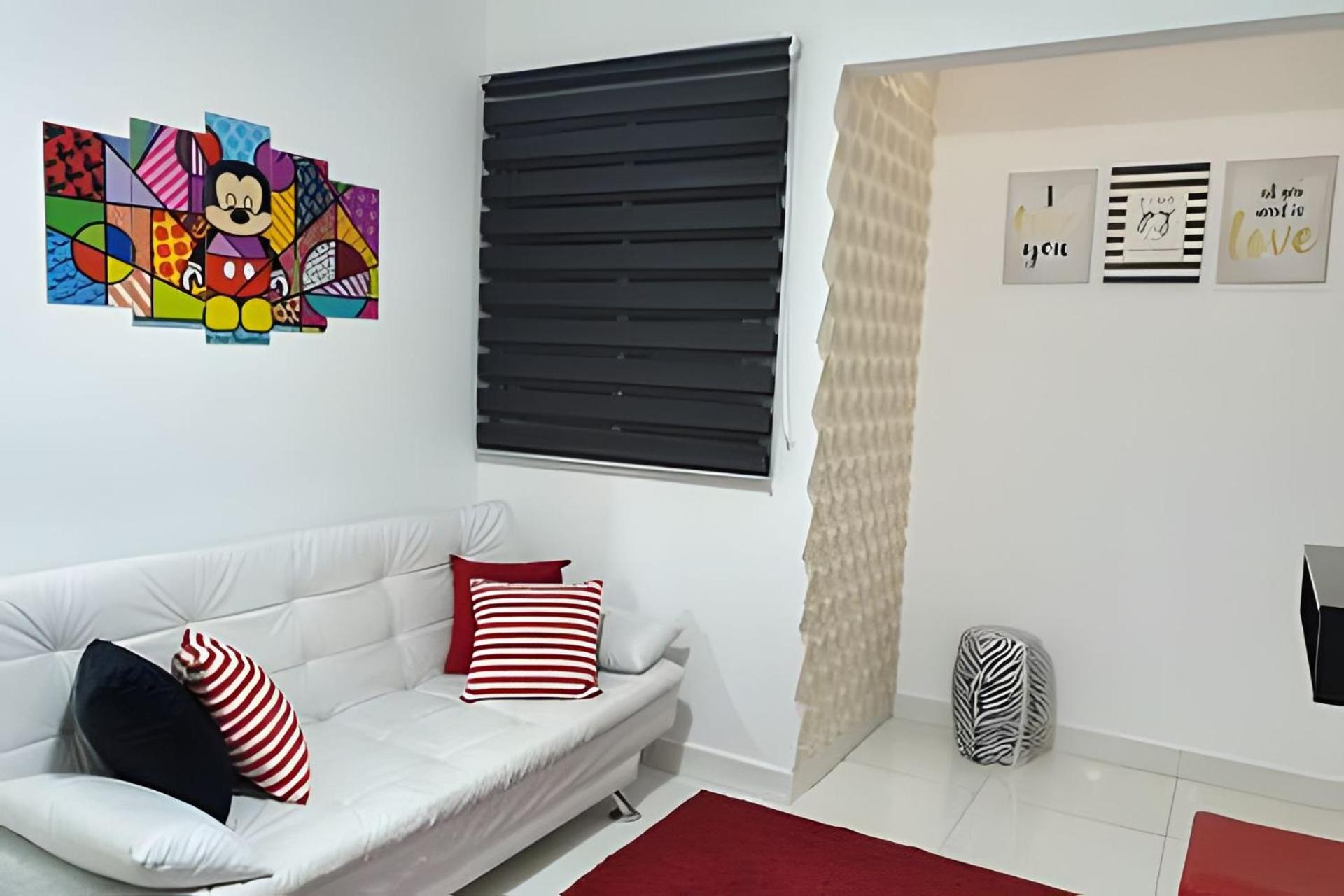 Apartamentos aconchegantes frente mar