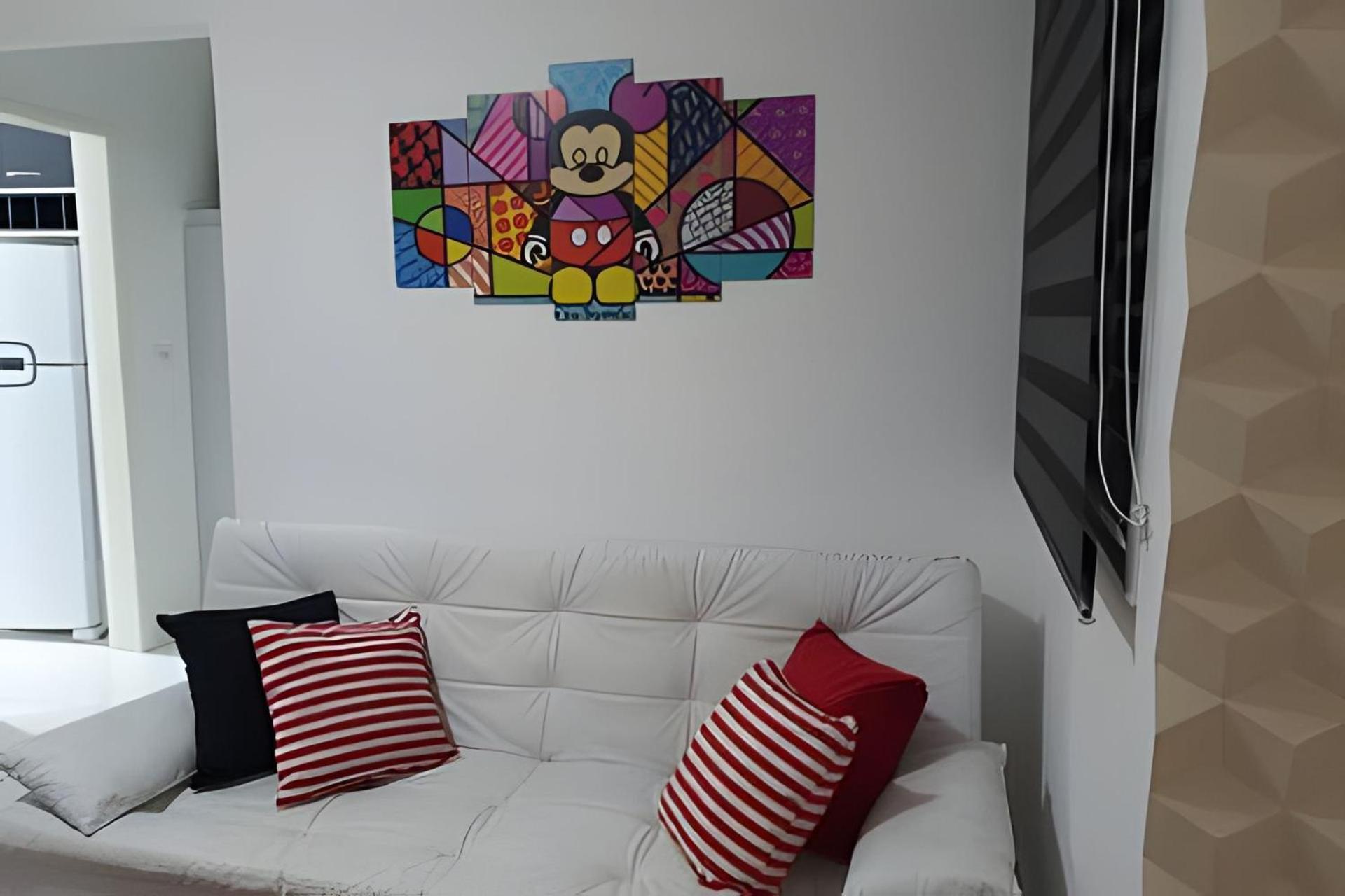 Apartamentos aconchegantes frente mar