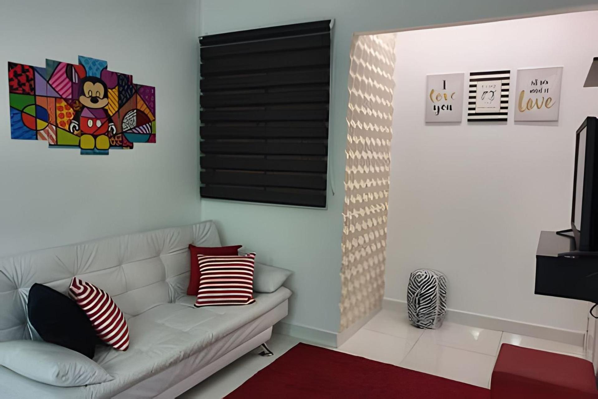 Apartamentos aconchegantes frente mar