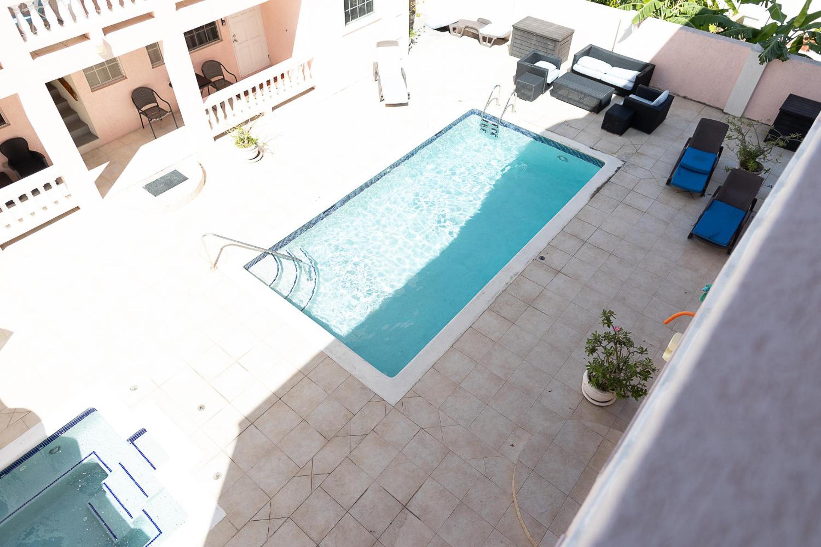Seashades 2BR 1 full and 1 half bathrooms Condo with pool Close to beach Sleeps 4