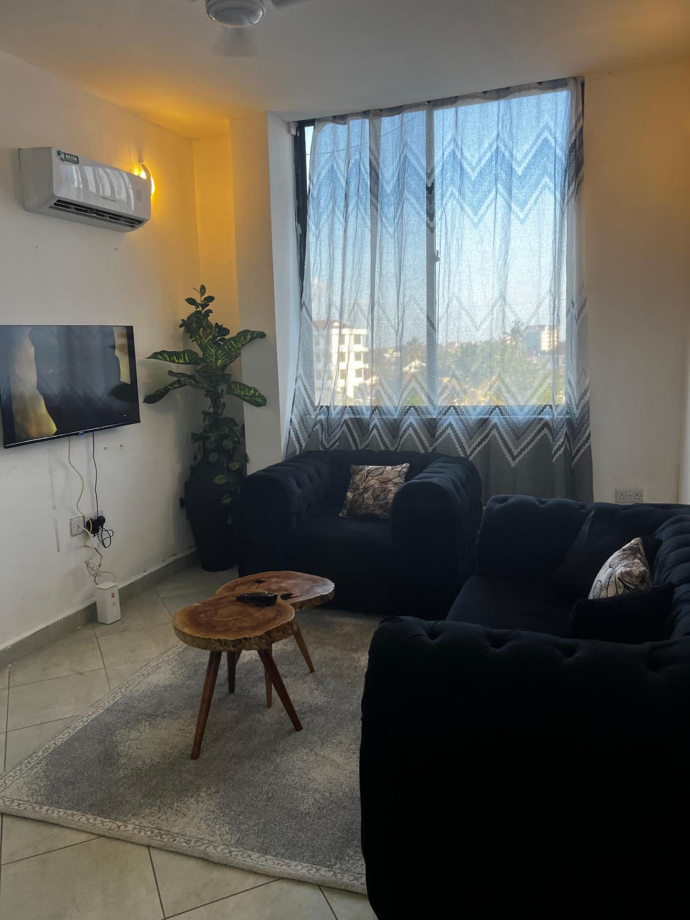 Accessible home near Mlimani City Mall with free WiFi & parking view 2