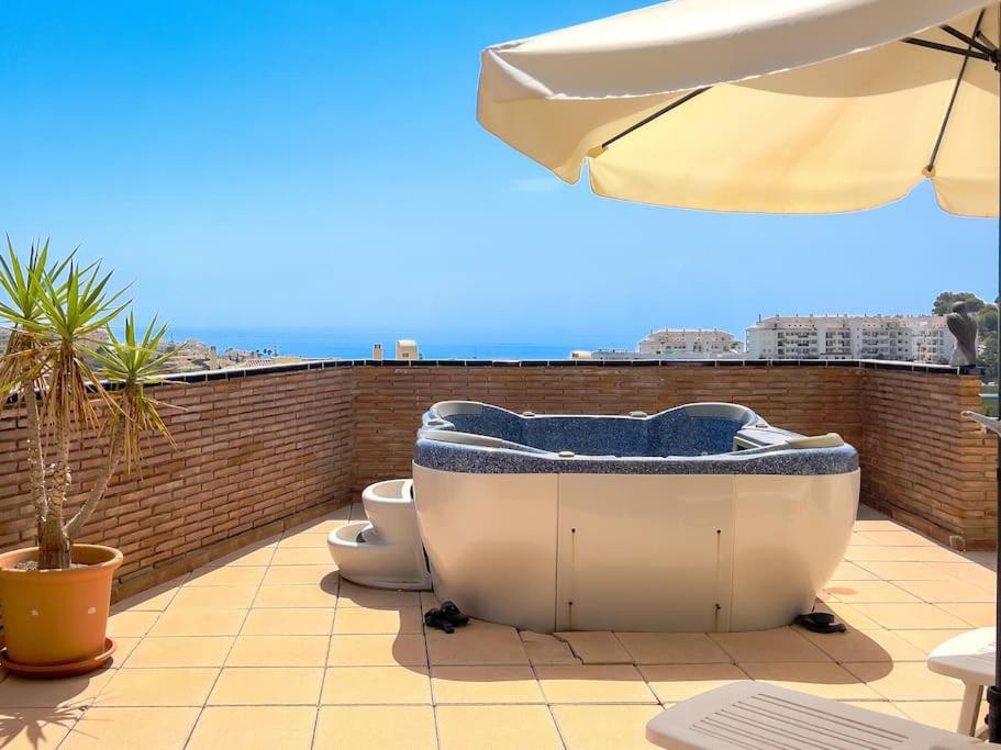 Ático con jacuzzi y vistas al mar