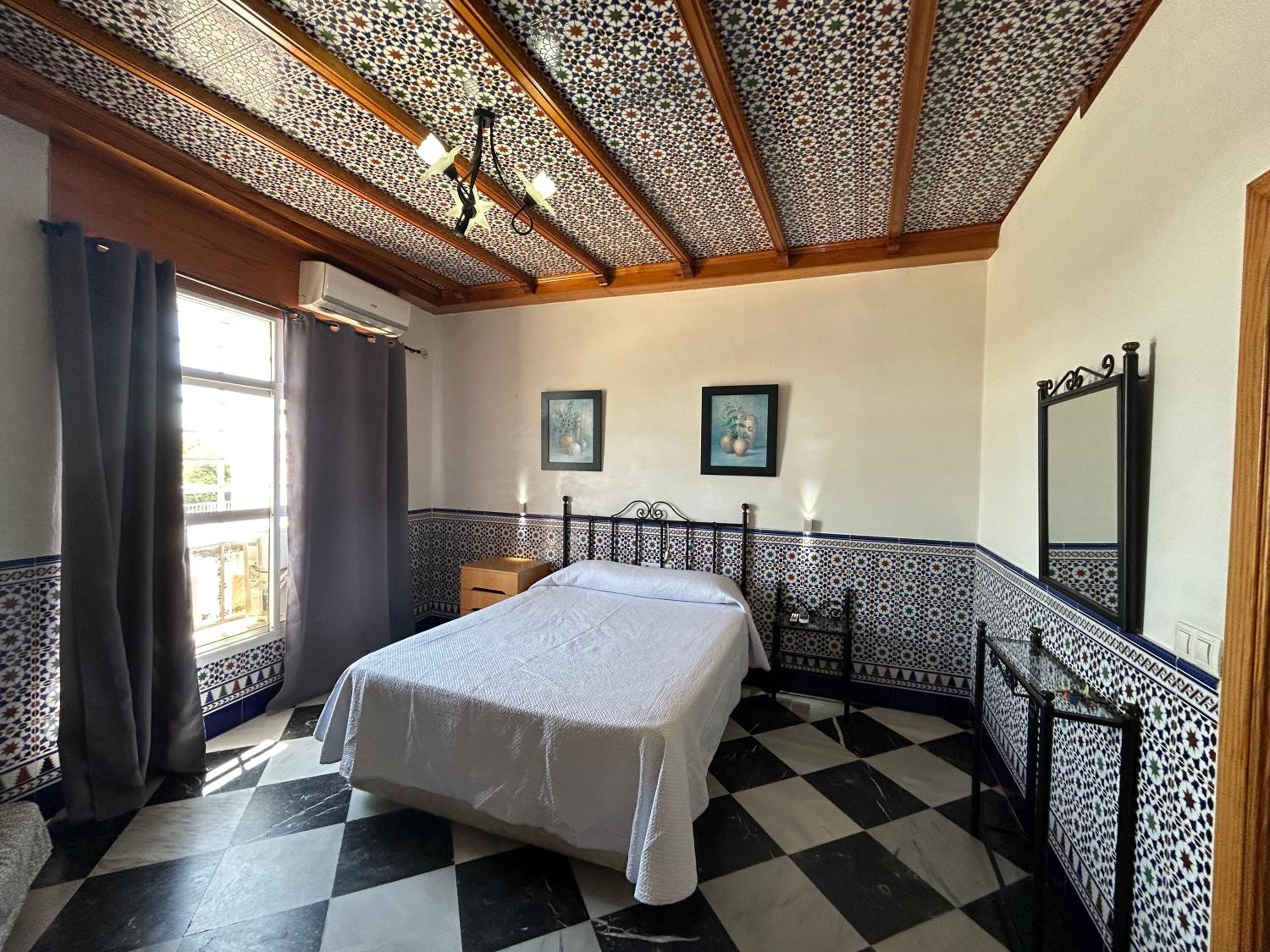 Hostal el Ancla en Alcalá del Río — bedroom