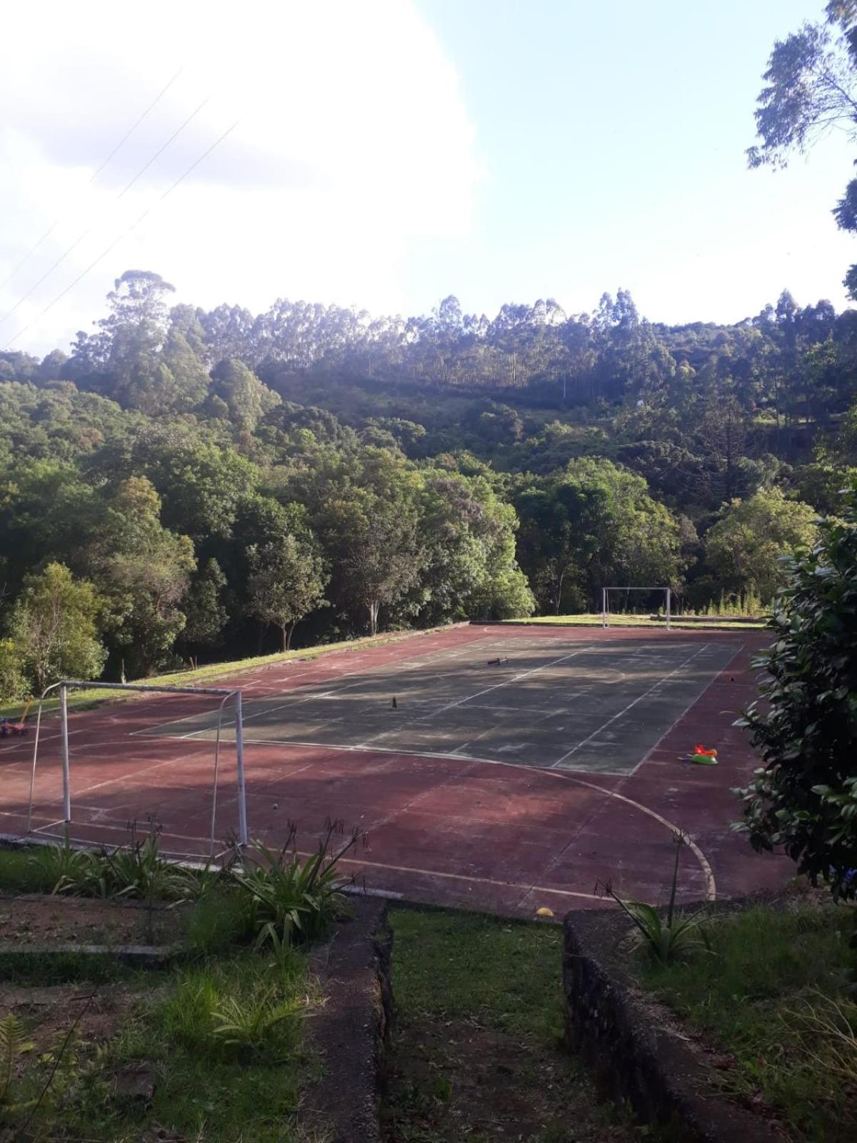 Sitio Tertulia Chalés e Cachoeira