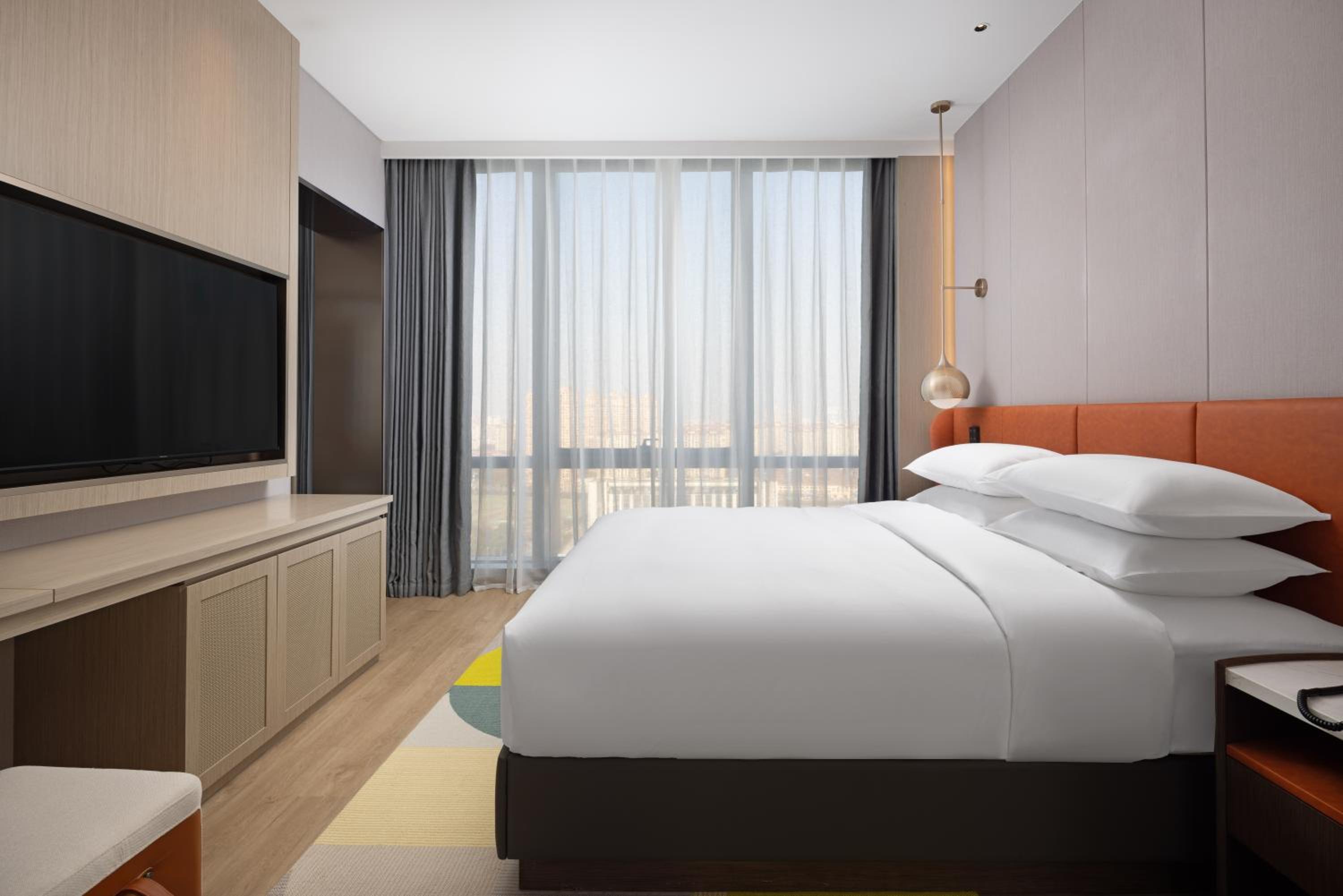 Home2 Suite by Hilton Jingjiang Binjiang New Town