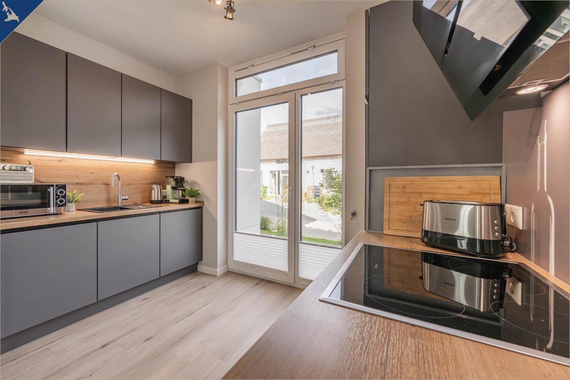 Störtebekers Reethus mit Sauna, Kamin und E-Ladesäule