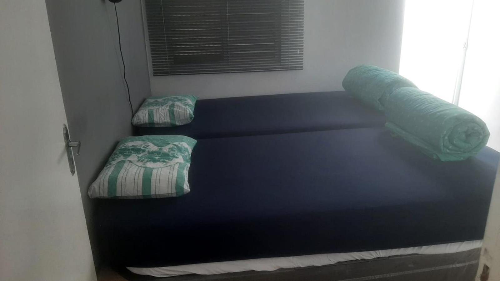 Aconchegante Microcasa Banheiro Privativo e Garagem Compartilhada
