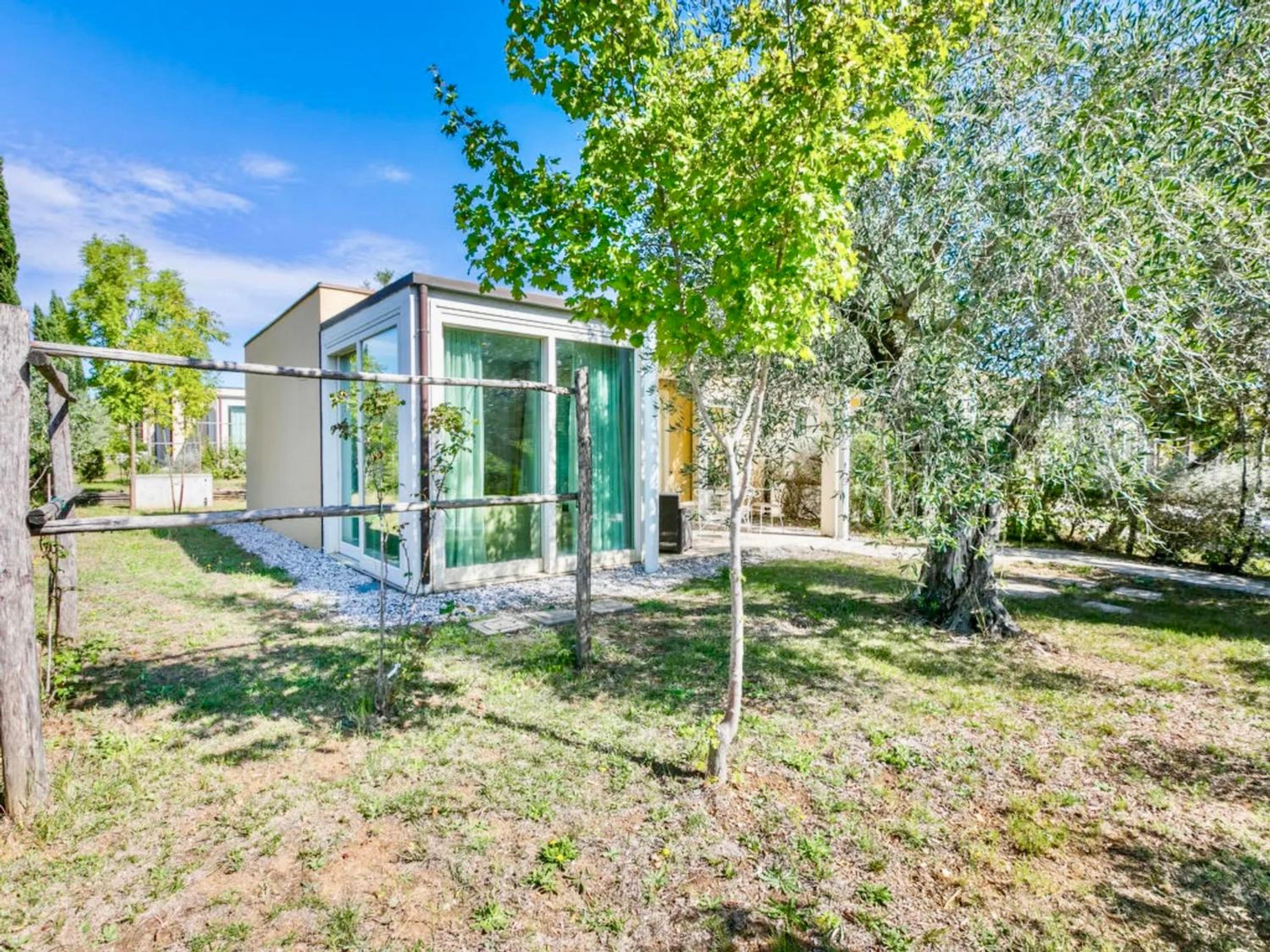 ISA-Green building-residence with swimming-pool in Cecina, elegant cottages with air conditioning and private outdoor area view 4