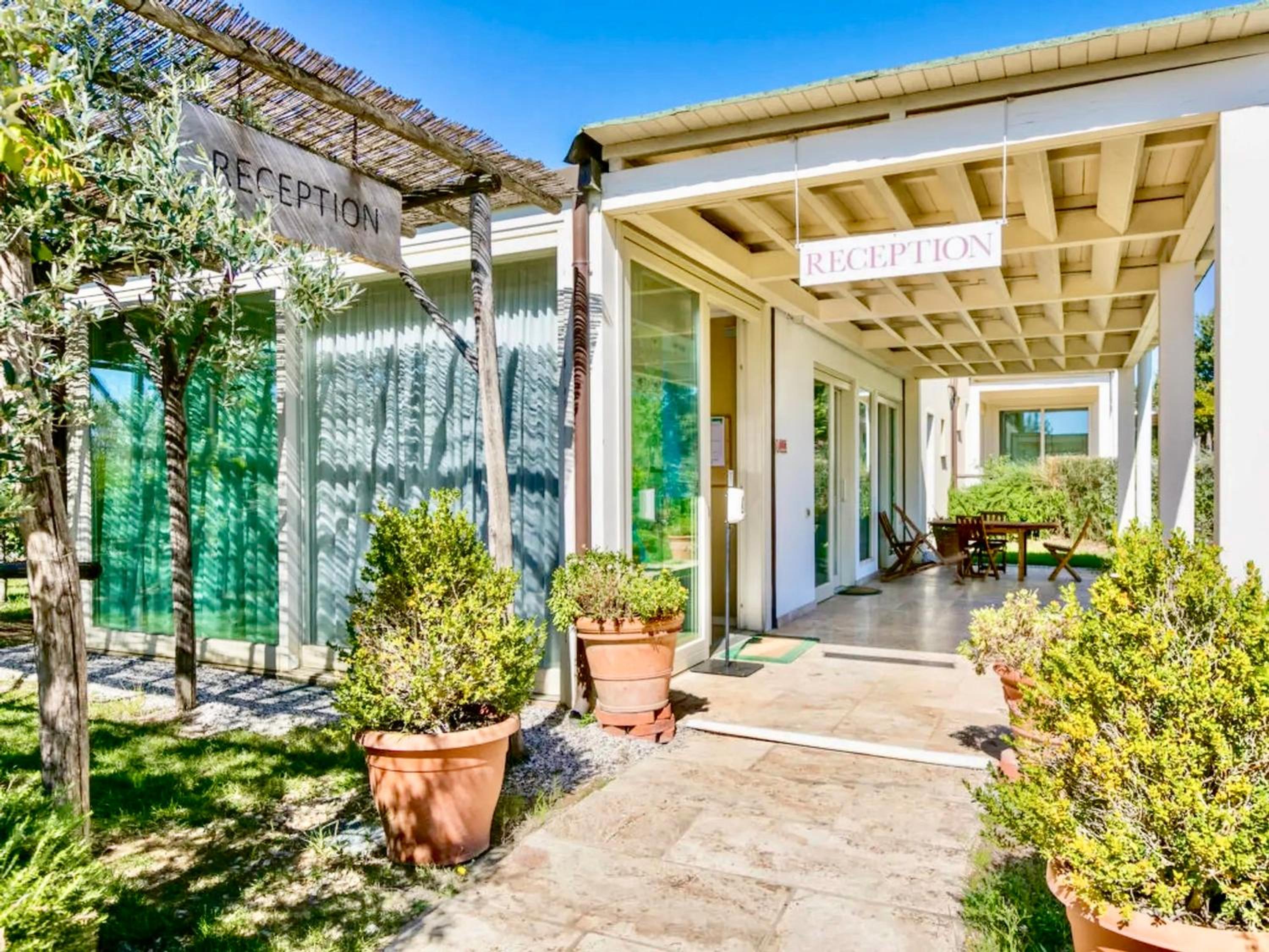 Green building-residence with swimming-pool immersed in the Tuscan countryside, elegant cottages with air conditioning and private outdoor space view 3