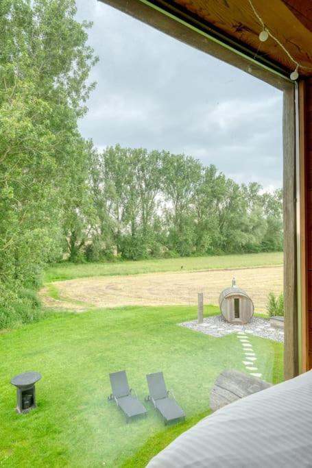 Cozy 4-Bedroom Chalet with Outdoor Spa in Zottegem