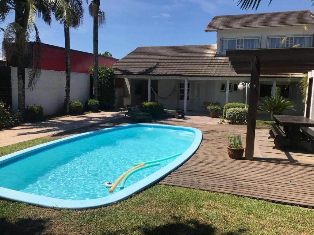 CASA AMPLA COM PISCINA em TORRES