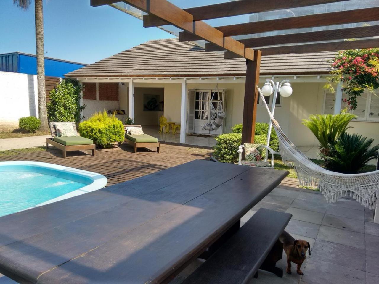 CASA AMPLA COM PISCINA em TORRES
