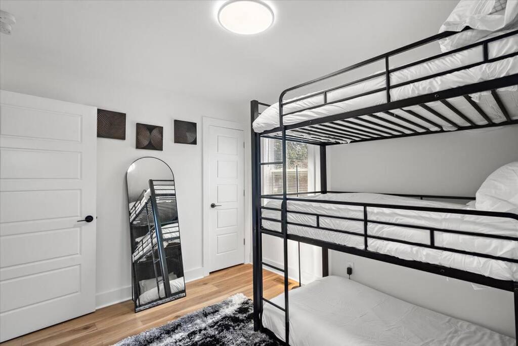 Renovated, Sleeps 9, Fire Pit & Games, 5 min to Uptown view 3